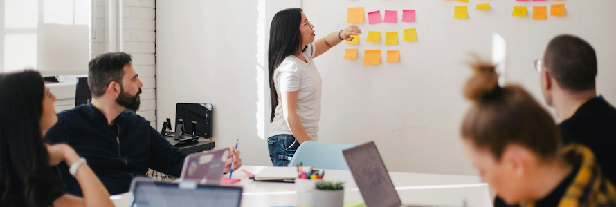 Team sat around a desk
